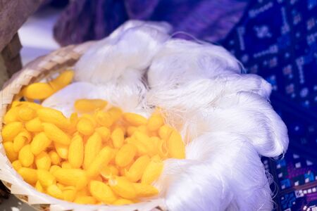 Silk is a natural protein fiber, This is a source of silk thread and silk fabric beautiful and colorful silkの写真素材