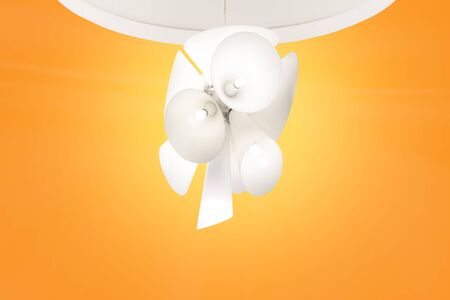 Vintage fashionable edison lamp on bright yellow background. Top view flat lay copy space. Creative idea concept, designer lamp, modern interior item. Lighting, electricity, background with lampの写真素材