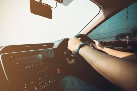 man driving car from rear view on the highway.の写真素材