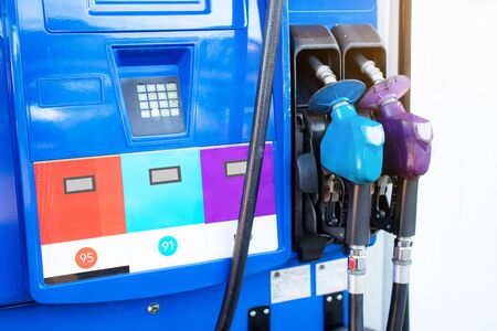 Oil nozzle or fuel injector and fuel dispenser, in pump station,consisting of petrol, diesel, ethanol and gasohol, energy and transportation business concept, alternative energy marketの写真素材