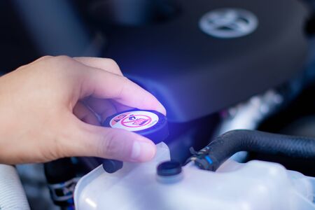 Check and maintenance car radiator with yourself. Service and maintenance car or vehicle.の写真素材