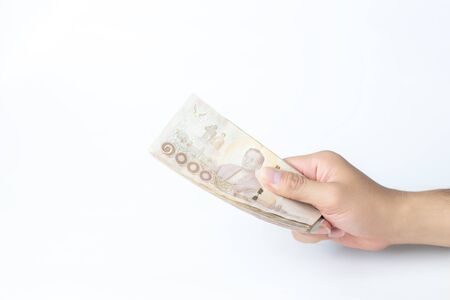 Hands holding cash. White background. isolated.