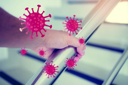 The most transmission of virus or bacteria from hand touch concept, Covid-19 or Coronavirus on the Banister, infection of Covid-19 virus,contamination,germs,bacteria that are frequently touched .の写真素材