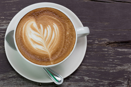 A cup of coffee with latte art.の写真素材