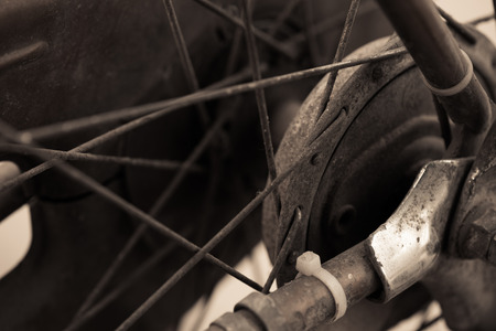 Very old bicycle wheel hub.Sepia toned.の写真素材