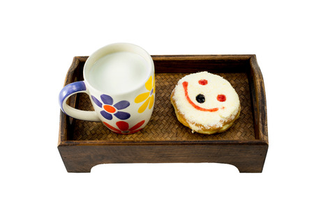 Donuts with a cup of milk isolated on white background.の写真素材