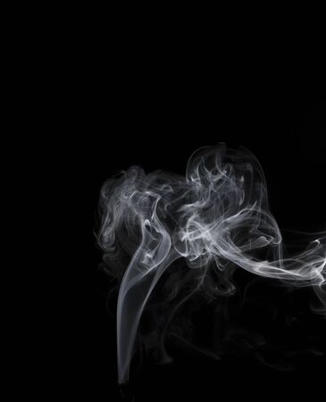 movement of smoke on black background, smoke background, abstract smoke on black backgroundの写真素材