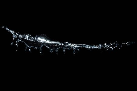 Splash water, clear clean water, isolated on a black background.の写真素材