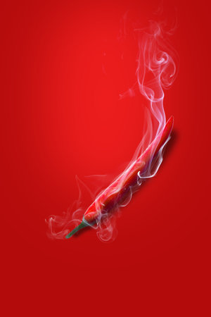 White smoke covered on red peppers, red peppers showing extreme heat For food menus that want to convey spiciness on a red background.の写真素材