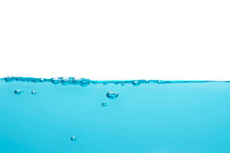 Bubbles float from the middle of the water rising to the water surface. Blue backgroundの写真素材