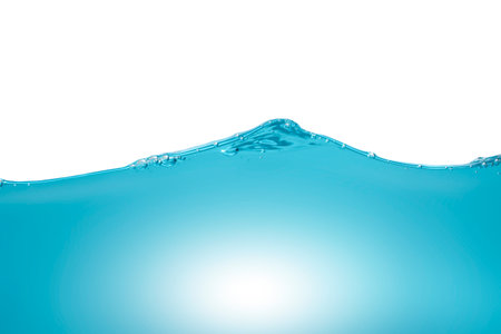 Beautiful water waves Splashed water wave in clean blue waterの写真素材