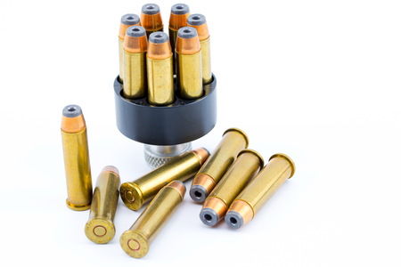 357 bullet cartridges with speed loader On a white background