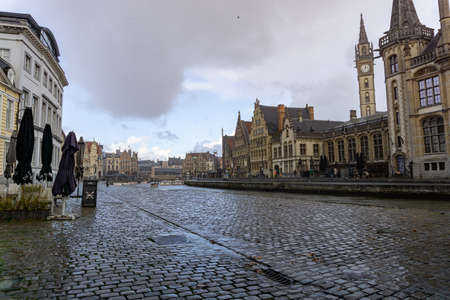 Typical view of Ghent, with some storm clouds, with the ground wetの写真素材