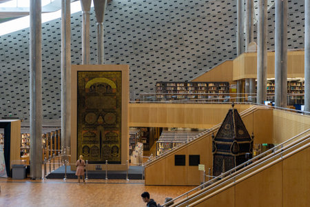 Interior of the Library of Alexandria, with its characteristic architecture and students reading.のeditorial素材
