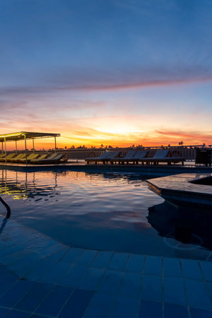 Sunset in the swimming pool of the Nile cruiseの写真素材