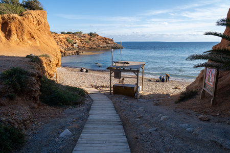 Sa Caleta beach on the island of Ibiza, on a sunny day in the afternoonの写真素材