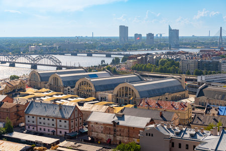 Panoramic of the skyline of the city of Riga captured from the tower of the Riga Academy of Sciences. Photo taken on a sunny day.の写真素材