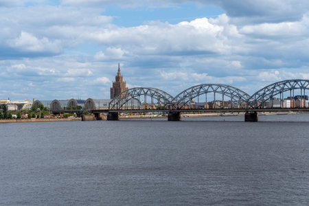 Riga City Train Bridge, With the Academy of Sciences and Arts in the background of the image. On a...