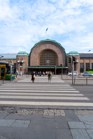 Helsinki city central train station. Pedestrians and circulating vehicles. sunny dayのeditorial素材