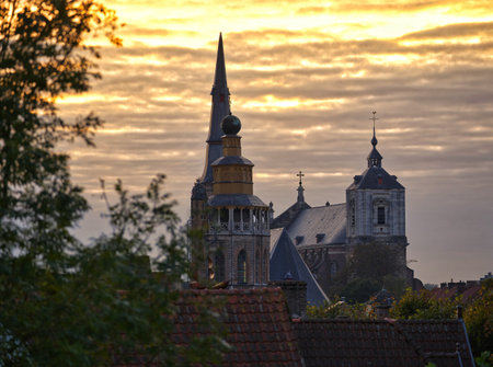 Cityscape of Bruges, Belgium, at sunset, with the Church of St. Francis of Assisi.の写真素材