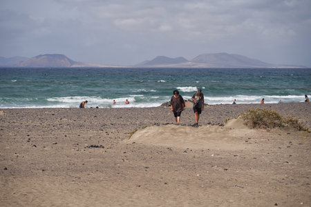 Tourists on the beach of Lanzarote