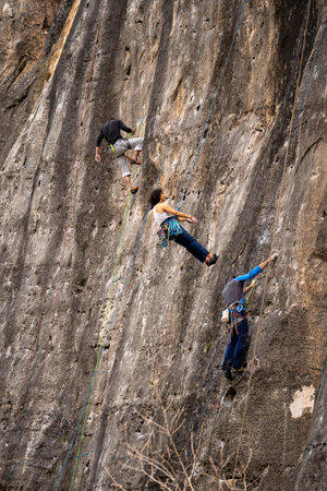 Rock climber climbing on a rocky wall. Extreme sport concept.の写真素材
