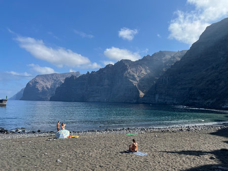 People on the beach in Santorini island, Greeceの写真素材
