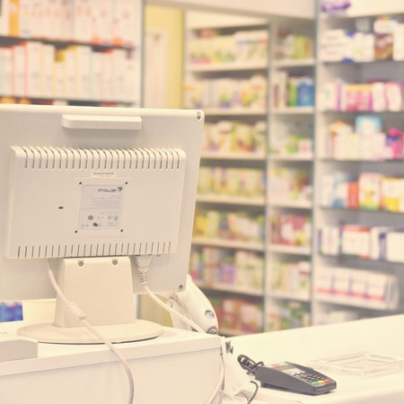 Checkout the pharmacy. Interior pharmacies and blurred background.のeditorial素材