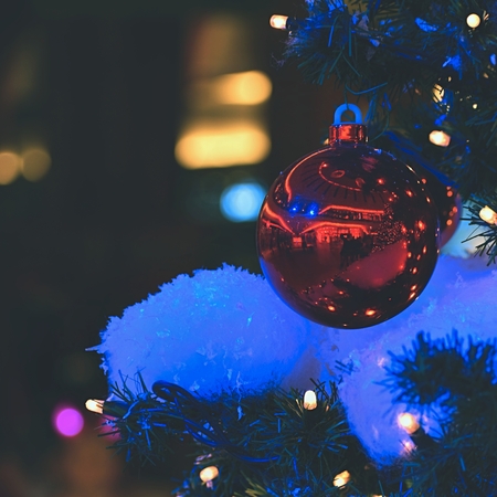Colorful christmas Decoration. Winter holidays and traditional ornaments. Lighting chains-bulbs for seasonal background.の写真素材