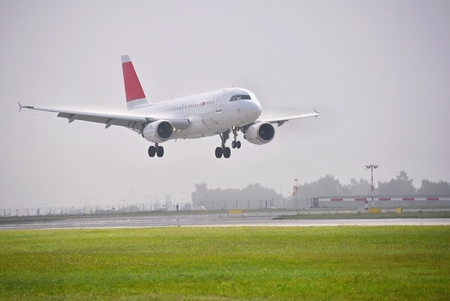 Airplane on the runway. Landing - take off at the airportのeditorial素材