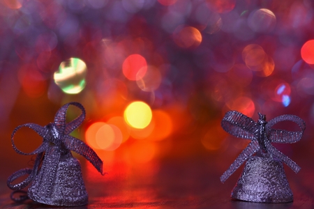 Christmas decorations. Beautiful Christmas tree ornaments on abstract, blurred colorful background. Concept for winter, holiday and snow.の写真素材