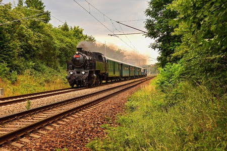 Beautiful old Czech train with steam locomotive. Concept for retro, travel and train travel. Train...