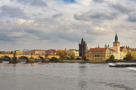 Prague, capital of the Czech Republic. Scenic sunset view of the Old Town pier architecture and Charles Bridge over Vltava river.の写真素材
