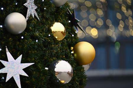 Christmas background with Christmas tree and decorations. Concept for holidays and winter time.