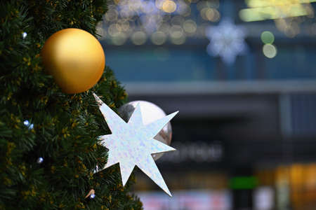 Christmas decorations. Beautiful colored Christmas tree. Concept for holidays and winter season.の写真素材