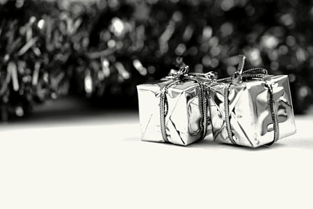 Christmas gift boxes on a white background. Black and white photo.の写真素材