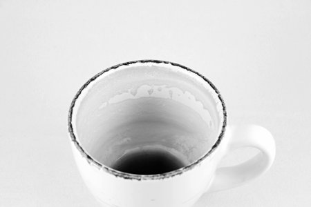 Coffee cup on a white background. Black and white.の写真素材
