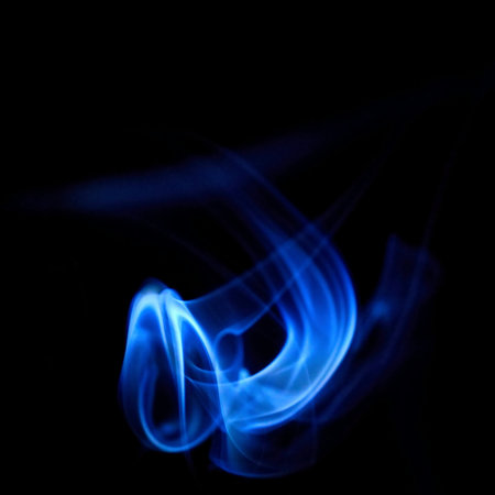 blue smoke on black background close-up. abstract image for your design