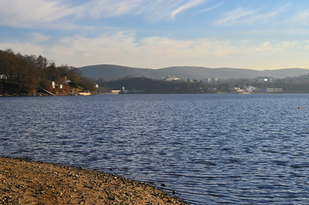 Brno Reservoir - City of Brno - Czech Republic - Europe. Beautiful landscape with water and beach. Nice sunny weather with blue sky in winter time.の写真素材