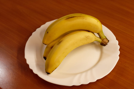 banana on white plateの写真素材