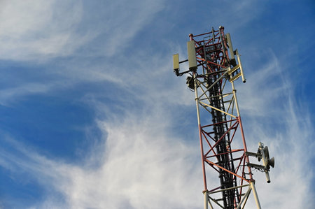 Telecommunication tower mast TV antennas wireless technology.
