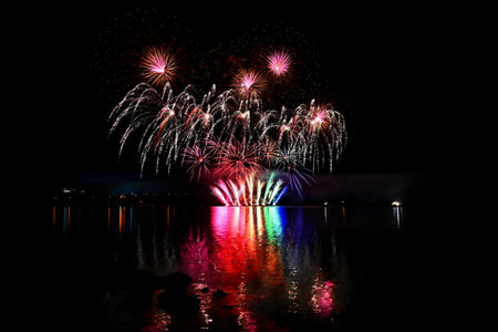 Beautiful colorful fireworks with reflections in water. Brno dam, the city of Brno-Europe. International Fireworks Competitionの写真素材