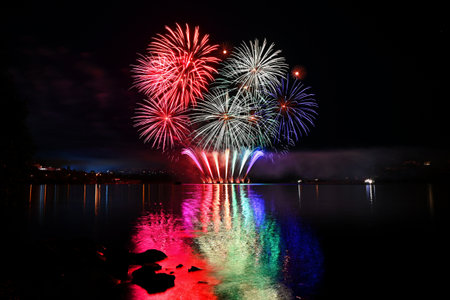 Beautiful colorful fireworks with reflections in water. Brno dam, the city of Brno-Europe. International Fireworks Competitionの写真素材