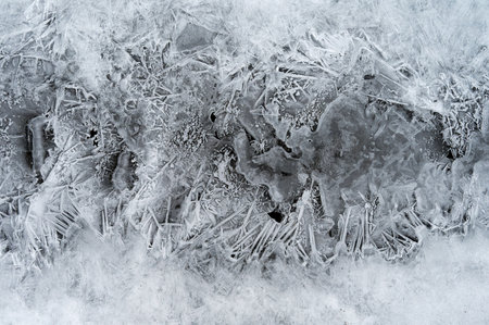 Macro shot of ice on a creek. Natural winter background. Macro shot of ice on a creek. Natural winter background.の写真素材
