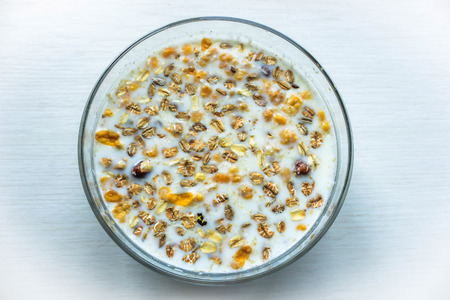 Tasty breakfast with cereals and berries under milkの写真素材