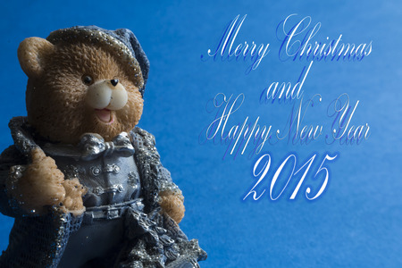 2015 Happy New Year background with happy bear toy