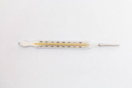 Mercury thermometer on white background
