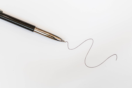 Metallic business pen isolated on white backgroundの写真素材