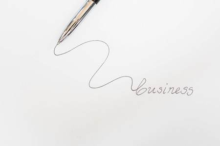 Metallic business pen isolated on white backgroundの写真素材