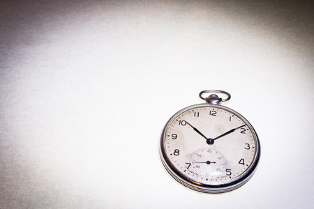 Russian antique pocket watch on white  background